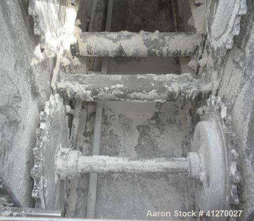 Used Deamco "S" Configuration Overlapping Bucket Elevator, model BES-09P-SW-X1-SS, type Solid Wall XI. Capacity 295 cubic feet an hour with 75% filled buckets. 84" horizontal bottom section, 134" ver...