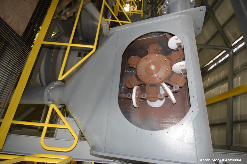 Unused- Hapman 12" Diameter Closed Tube Drag Conveyor, Carbon Steel. Approximately 12" diameter plastic pucks x 170' long, 30hp motor. 50 Tons per hour, 75-100 pounds per cubic foot.