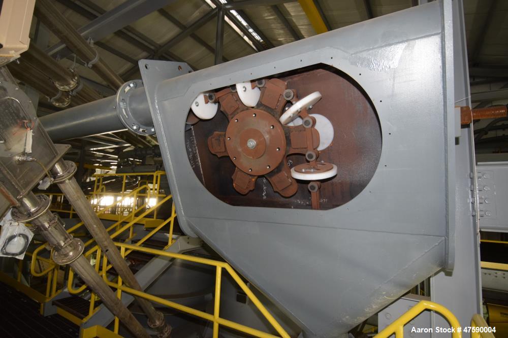 Unused- Hapman 12" Diameter Closed Tube Drag Conveyor, Carbon Steel. Approximately 12" diameter plastic pucks x 170' long, 30hp motor. 50 Tons per hour, 75-100 pounds per cubic foot.