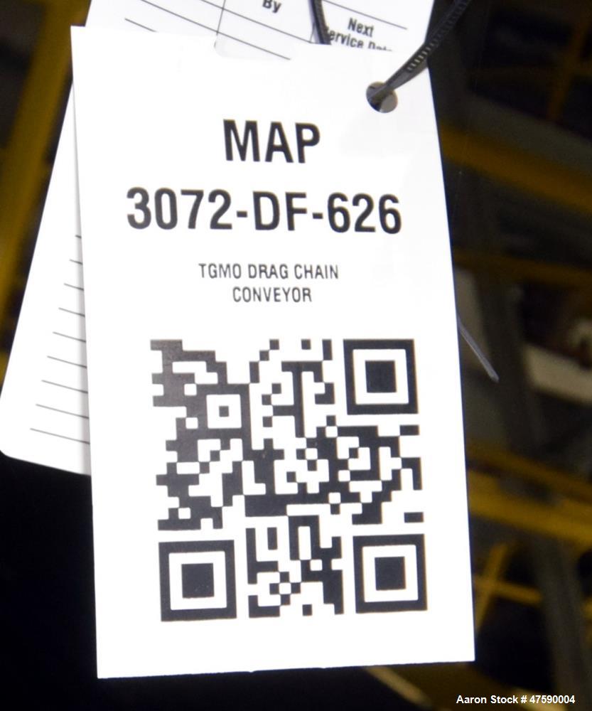 Unused- Hapman 12" Diameter Closed Tube Drag Conveyor, Carbon Steel. Approximately 12" diameter plastic pucks x 170' long, 30hp motor. 50 Tons per hour, 75-100 pounds per cubic foot.