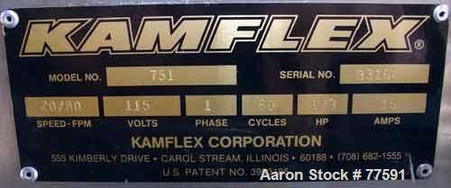 Used Kamflex Design Vertical Belt Conveyor. 10" Wide x 7'7.58" long rubber belt with 10" wide x 1-1/2" deep pockets, 43" discharge height with a 3-3/4" diameter discharge. Product density 30 lbs/cubi...