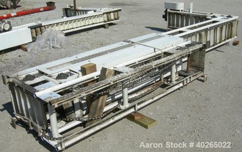 Unused- Deamco Overlapping Bucket Elevator, Model BES-12P-T, carbon steel.  Approximately 189" tall.  Plastic buckets 12" long x 4" wide x approximately 2 1/2" deep.  Driven by a 1/2 hp, 3/60/230/460...