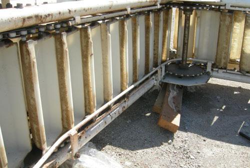 Unused- Deamco Overlapping Bucket Elevator, Model BES-12P-T, carbon steel.  Approximately 189" tall.  Plastic buckets 12" long x 4" wide x approximately 2 1/2" deep.  Driven by a 1/2 hp, 3/60/230/460...
