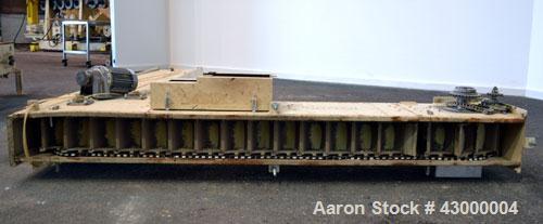 Used RBM Conveyor Systems Bucket Elevator, Model S100-6SW-DC, Carbon Steel. Standard S design. Approximately 240 cubic feet an hour capacity.  0.82 Liter plastic bucket volume, 6 wide x 4-1/2 long x ...