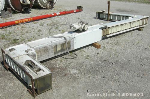 Used Deamco Corp. Overlapping Bucket Elevator, Carbon Steel. Approximately 17'-5" tall. Plastic buckets 6" long x 4" wide x approximately 2-1/2" deep. Approximate 35" long bottom horizonatl section x...