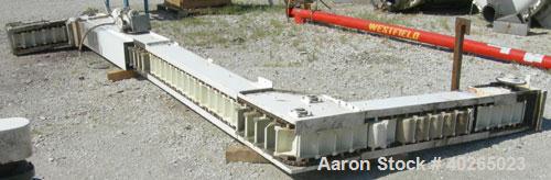 Used Deamco Corp. Overlapping Bucket Elevator, Carbon Steel. Approximately 17'-5" tall. Plastic buckets 6" long x 4" wide x approximately 2-1/2" deep. Approximate 35" long bottom horizonatl section x...