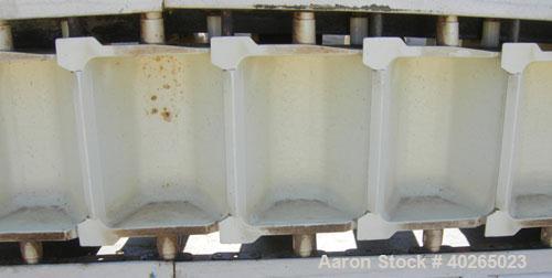 Used Deamco Corp. Overlapping Bucket Elevator, Carbon Steel. Approximately 17'-5" tall. Plastic buckets 6" long x 4" wide x approximately 2-1/2" deep. Approximate 35" long bottom horizonatl section x...