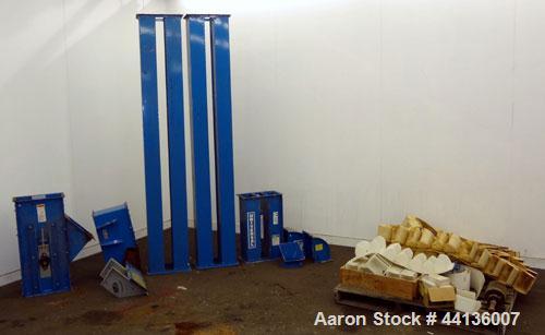 Used Universal Industries Vertical Bucket Elevator, Model C3-175, Carbon Steel. Capacity free flowing material 220 cubic feet per hour, approximately 27’ discharge height, 29’ overall height. Plastic...