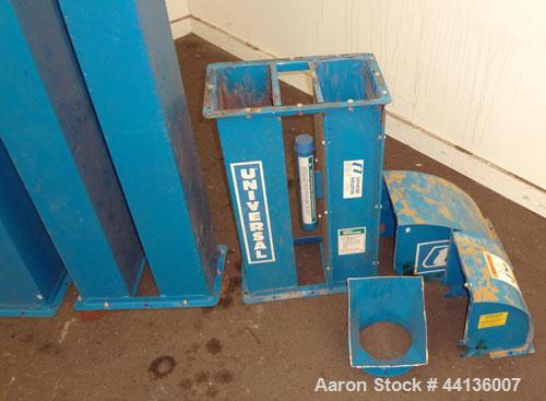 Used Universal Industries Vertical Bucket Elevator, Model C3-175, Carbon Steel. Capacity free flowing material 220 cubic feet per hour, approximately 27’ discharge height, 29’ overall height. Plastic...