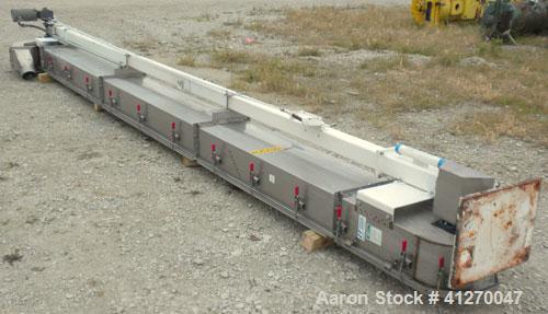 Used Universal Industries Vertical Bucket Elevator, Model SC, 304 Stainless Steel Frame. Plastic buckets approximately 6’’ wide x 4’’ long x 4’’ deep, on 4-1/2’’ centers. Driven by a 1 hp, 3/60/230/4...