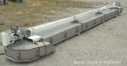 Used Universal Industries Vertical Bucket Elevator, Model SC, 304 Stainless Steel Frame. Plastic buckets approximately 6’’ wide x 4’’ long x 4’’ deep, on 4-1/2’’ centers. Driven by a 1 hp, 3/60/230/4...