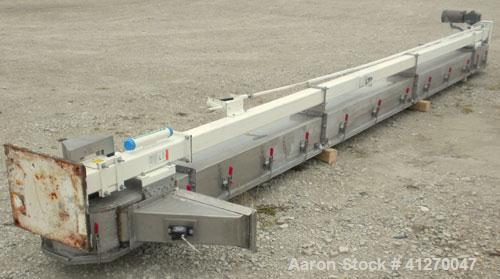 Used Universal Industries Vertical Bucket Elevator, Model SC, 304 Stainless Steel Frame. Plastic buckets approximately 6’’ wide x 4’’ long x 4’’ deep, on 4-1/2’’ centers. Driven by a 1 hp, 3/60/230/4...