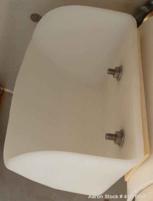 Used Universal Industries Vertical Bucket Elevator, Model SC, 304 Stainless Steel Frame. Plastic buckets approximately 6’’ wide x 4’’ long x 4’’ deep, on 4-1/2’’ centers. Driven by a 1 hp, 3/60/230/4...