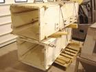 USED: 18' discharge height Gough Econ zig-zag bucket elevator. Dateof manufacture 11/13/91. 2 hp, 230/460 volt, 1730 rpm motor with gearreducer and chain drive. Elevator vertical section interior dim...