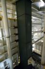 Used KWS Bucket Elevator, Model 37X55-1/2 NC, Carbon Steel. 70’ Shaft centers, capable of 160 tons per hour of Trona Ore at 85 pounds per cubic foot, operating capacity 80 short tons per hour. Dimens...