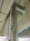Used Smalley Buket Elevator with Carbon Steel Frame Approximate 17 ft Discharge Height