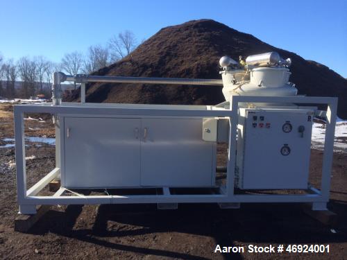Unused- AZO Pneumatic Conveyor. Skid mounted. Includes: hopper, filters, blower, electric motor, rotary airlock, soundproof enclosure, control box, stainless steel plumbing. Max blower vacuum suction...