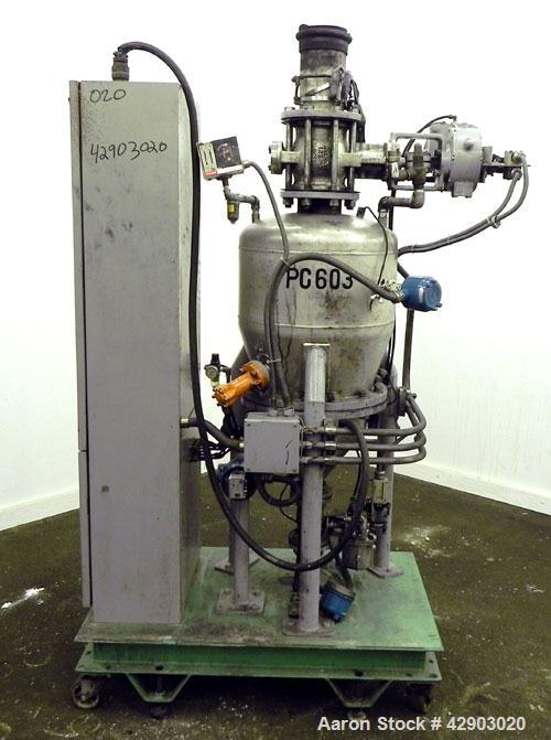 Used Nippon Pneumatic Conveyor, Model HT, 304 Stainless Steel. Includes a control panel. Mounted on a carbon steel base with casters.