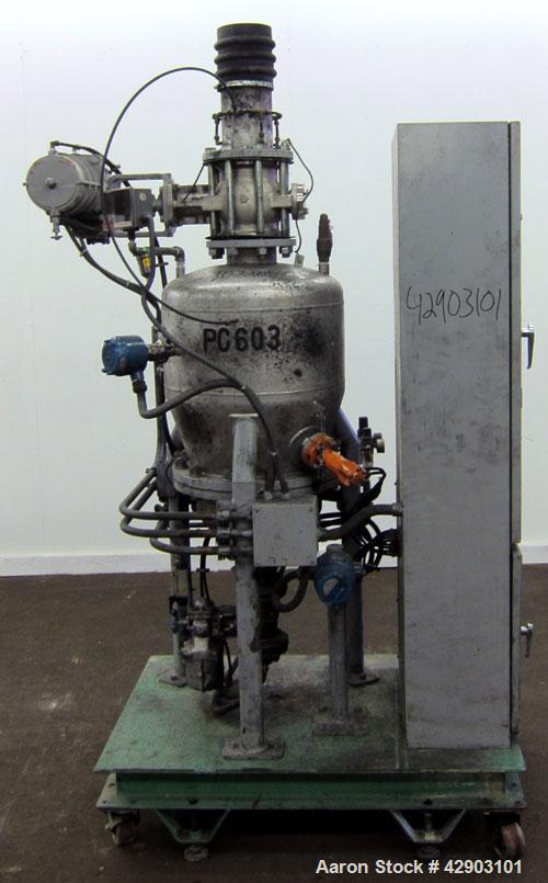 Used Nippon Pneumatic Conveyor, Model HT, 304 Stainless Steel. Includes a control panel. Mounted on a carbon steel base with casters.