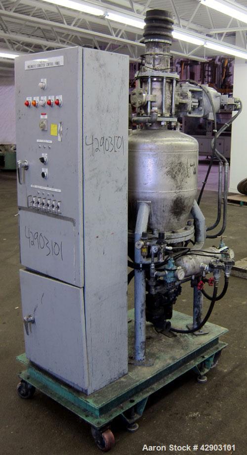 Used Nippon Pneumatic Conveyor, Model HT, 304 Stainless Steel. Includes a control panel. Mounted on a carbon steel base with casters.