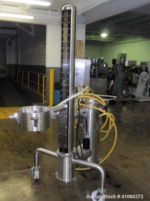 Used PIAB vacuum conveyor system, stainless steel construction with model MLL200 vacuum pump with filter, mounted on protable stainless steel stand with reciever, ART#34.01.056.
