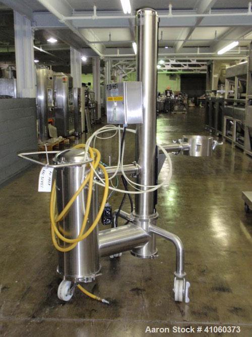 Used PIAB vacuum conveyor system, stainless steel construction with model MLL200 vacuum pump with filter, mounted on protable stainless steel stand with reciever, ART#34.01.056.

