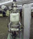Used Nippon Pneumatic Conveyor, Model HT, 304 Stainless Steel. Includes a control panel. Mounted on a carbon steel base with casters.