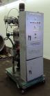 Used Nippon Pneumatic Conveyor, Model HT, 304 Stainless Steel. Includes a control panel. Mounted on a carbon steel base with casters.