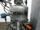 Used Nippon Pneumatic Conveyor, Model HT, 304 Stainless Steel. Includes a control panel. Mounted on a carbon steel base with casters.