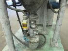 Used Nippon Pneumatic Conveyor, Model HT, 304 Stainless Steel. Includes a control panel. Mounted on a carbon steel base with casters.