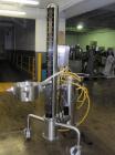 Used PIAB vacuum conveyor system, stainless steel construction with model MLL200 vacuum pump with filter, mounted on protable stainless steel stand with reciever, ART#34.01.056.
