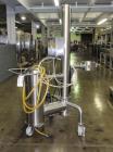 Used PIAB vacuum conveyor system, stainless steel construction with model MLL200 vacuum pump with filter, mounted on protable stainless steel stand with reciever, ART#34.01.056.

