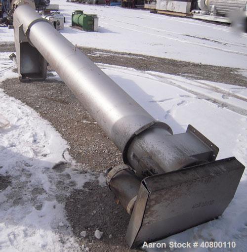 Used Hydrolift Vertical Screw Conveyor, 304 stainless steel. 16" diameter x 168" long x 6" pitch. Enclosed tube approximately 17" diameter. Top infeed hopper approximately 15 3/4" wide x 27 1/2" long...