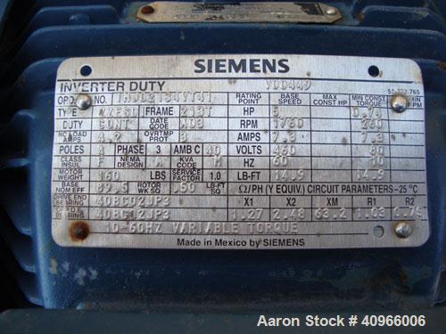 Used Incline screw conveyor, 304 stainless steel. 6" diameter x 168" long x 3" pitch screw with 7" diameter enclosed tube, driven by a 5 hp, 3/60/460 volt, 1760 rpm motor thru a Dodge reducer,
