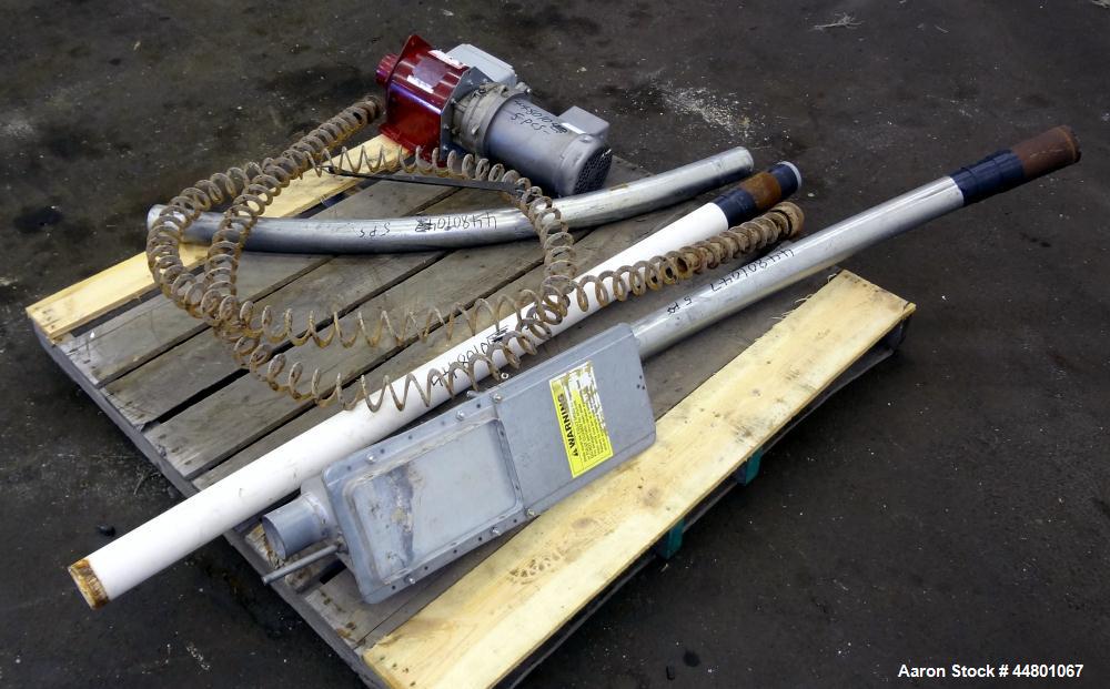 Used Flexible Screw Conveyor, Carbon Steel. Approximate 2-5/8" diameter x 180" long flexible screw, (2) sections of metal tubing, approximate 2-3/4" diameter, (1) 64" long with feed housing, (1) 50" ...