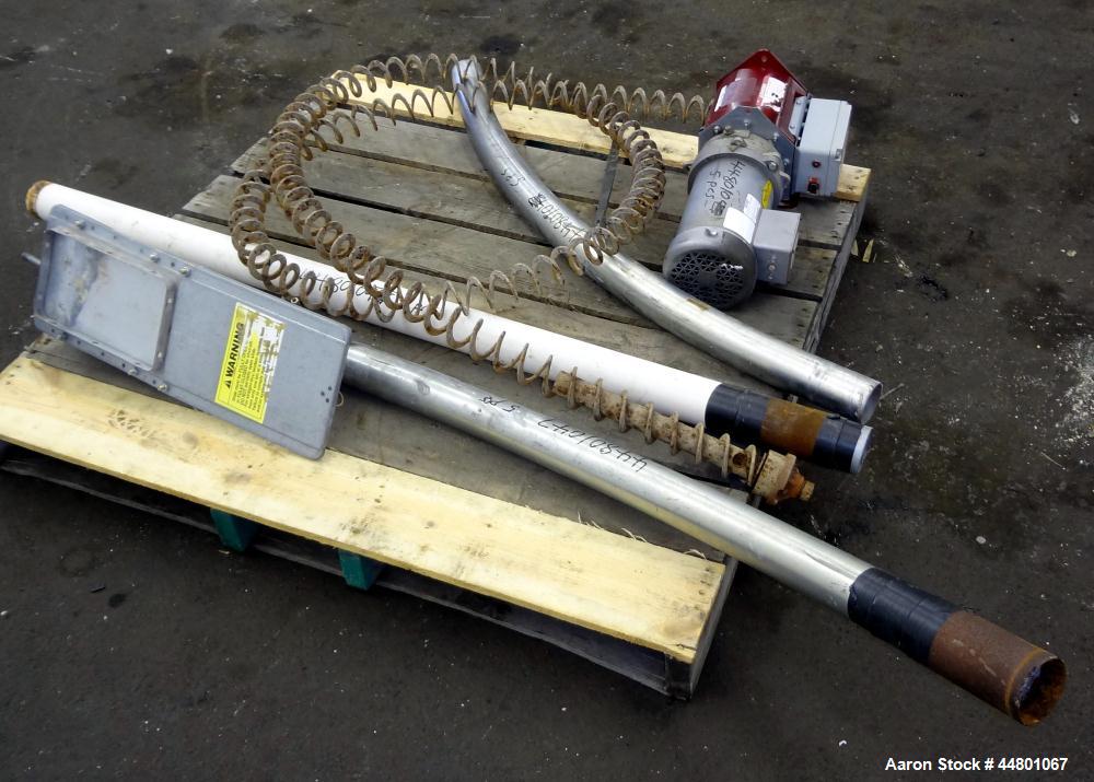 Used Flexible Screw Conveyor, Carbon Steel. Approximate 2-5/8" diameter x 180" long flexible screw, (2) sections of metal tubing, approximate 2-3/4" diameter, (1) 64" long with feed housing, (1) 50" ...