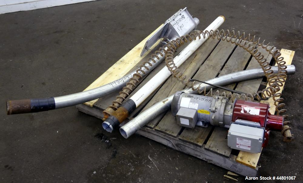 Used Flexible Screw Conveyor, Carbon Steel. Approximate 2-5/8" diameter x 180" long flexible screw, (2) sections of metal tubing, approximate 2-3/4" diameter, (1) 64" long with feed housing, (1) 50" ...