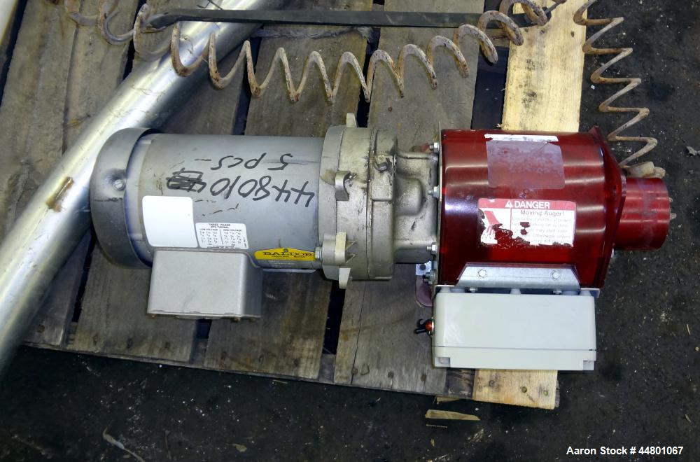 Used Flexible Screw Conveyor, Carbon Steel. Approximate 2-5/8" diameter x 180" long flexible screw, (2) sections of metal tubing, approximate 2-3/4" diameter, (1) 64" long with feed housing, (1) 50" ...