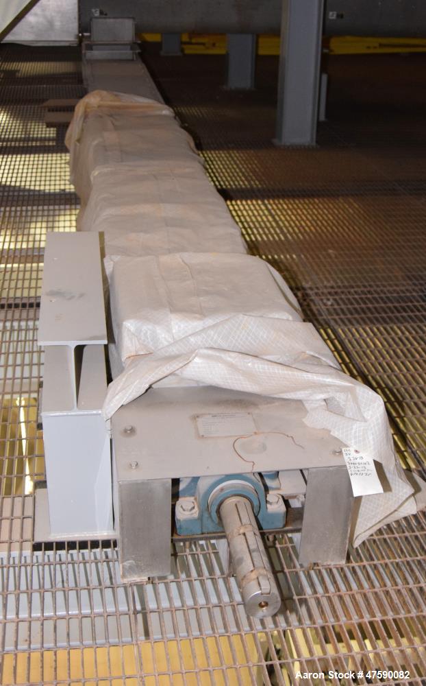 Unused- Orthman Screw Conveyor, 316 Stainless Steel. Approximate 12” diameter x 273” long screw, 6” pitch. Maximum capacity 40 cubic feet per hour at 50 pounds a cubic foot material density. Driven b...
