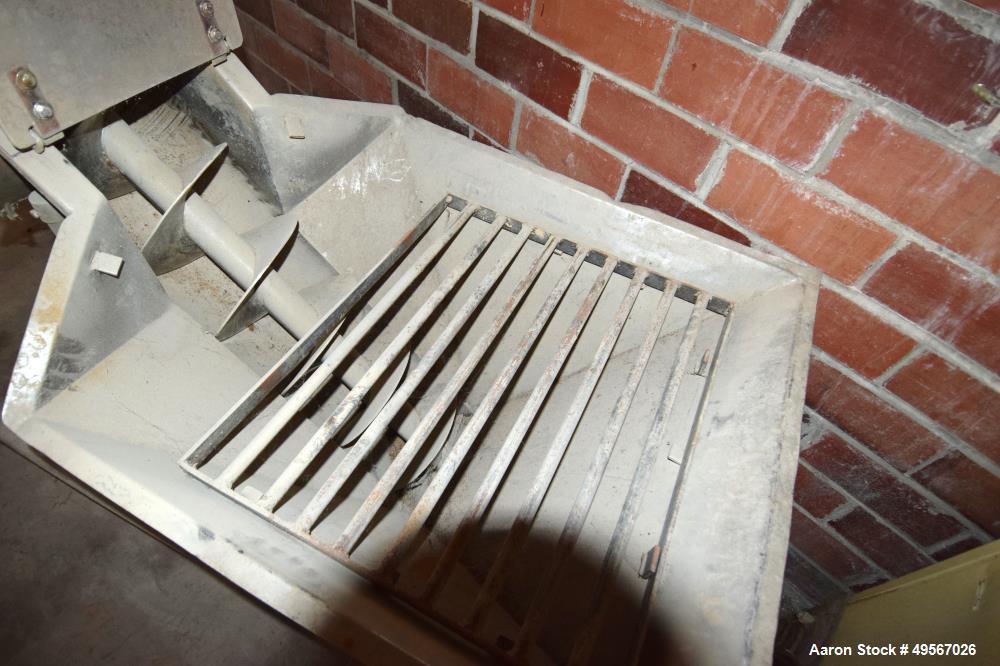 Used Inline Screw Conveyor, Stainless Steel. Approximate 10" diameter x 132" long x 3" pitch screw, driven by an approximate 5hp motor. 30" x 33" Bottom feed hopper with a carbon steel safety grate, ...