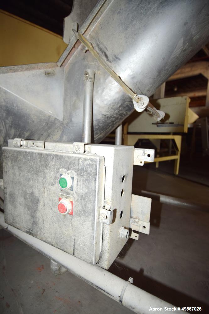 Used Inline Screw Conveyor, Stainless Steel. Approximate 10" diameter x 132" long x 3" pitch screw, driven by an approximate 5hp motor. 30" x 33" Bottom feed hopper with a carbon steel safety grate, ...