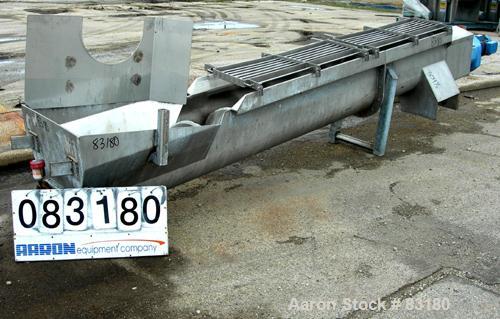 USED: Incline screw conveyor, 304 stainless steel. 14" diameter x 12'6" long x 6" pitch screw, approximately 1/2" thick Teflon screw tip. End feed with bin, top bottom outlet. Top safety grate sectio...