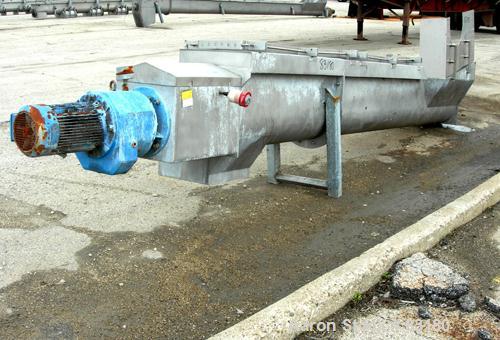 USED: Incline screw conveyor, 304 stainless steel. 14" diameter x 12'6" long x 6" pitch screw, approximately 1/2" thick Teflon screw tip. End feed with bin, top bottom outlet. Top safety grate sectio...