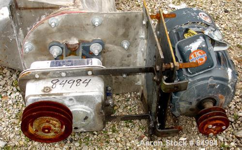 USED: Screw conveyor, enclosed tube, 304 stainless steel, horizontal. 12" diameter x 216" long screw. 12" x 12" end top feed, 12" x 12" end bottom outlet. Driven by a 10 hp, 3/60/208-230/460 volt, 17...