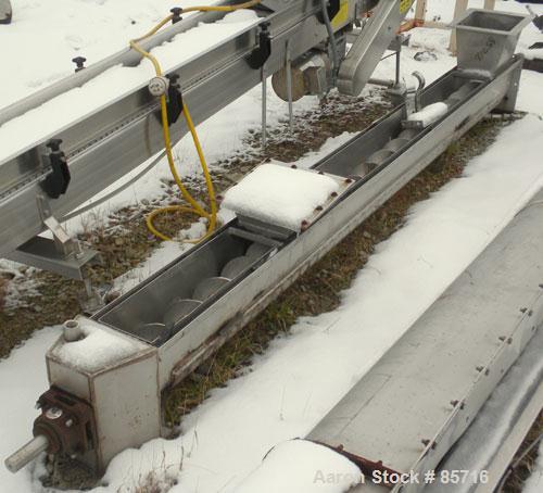 Used Screw Conveyor, 316 Stainless Steel. 6" diameter x 10' long, dimple jacketed. 6" pitch. 10" x 10" top infeed, 8" x 8" discharge. No drive or top cover.