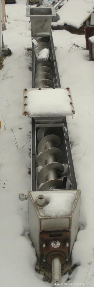Used Screw Conveyor, 316 Stainless Steel. 6" diameter x 10' long, dimple jacketed. 6" pitch. 10" x 10" top infeed, 8" x 8" discharge. No drive or top cover.