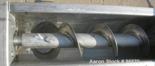 USED: Screw Conveyor, 304 stainless steel, horizontal. 6" diameter x 128" long x 3" pitch screw. Clamp down top covers. (2) 4" bottom outlets, (1) 4" top opening. Driven by a 1 hp, 3/60/230/460 volt,...