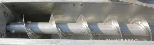 USED: Screw conveyor, 304 stainless steel, horizontal. 6" diameter x 120" long x 3" pitch screw. Clamp down top covers. (2) 4" bottom outlets, (1) 4" top opening. Driven by a 1 hp, 3/60/208-230/460 v...