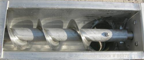 USED: Screw conveyor, 304 stainless steel, horizontal. 6" diameter x 128" long x 3" pitch screw. Clamp down top covers. (2) 4" bottom outlets, (1) 4" top opening. Driven by a 1 hp, 3/60/230/460 volt,...