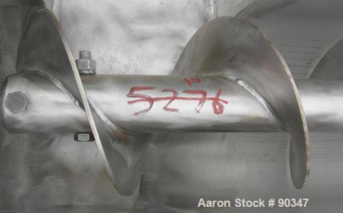 Unused- Dalex Screw conveyor, 304 stainless steel, horizontal. 9" diameter x 111" long x 4" pitch screw. 10" x 10" side opening, (3) 10" bottom outlets. Trough measures 10" wide x 122" long x approxi...